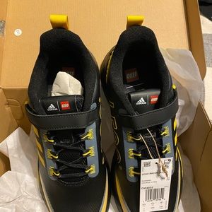 Black and Yellow Adidas sneakers
